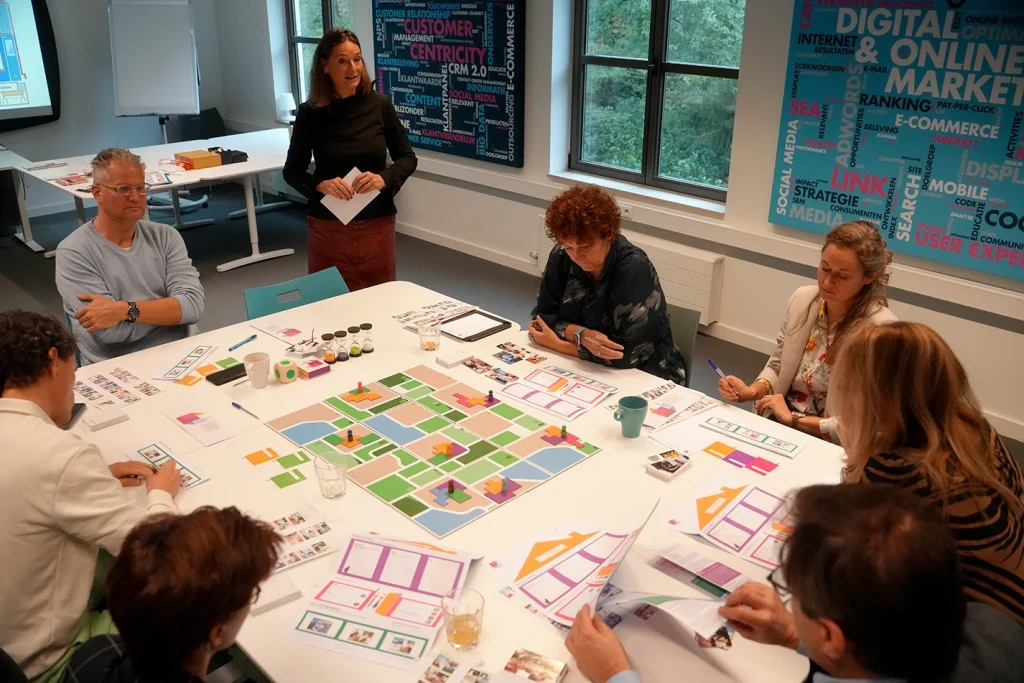 Groep die Build Your Brand game spelen